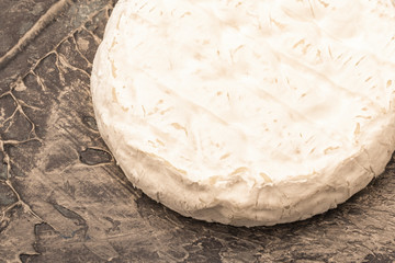 Camembert cheese with white mold. Snack to wine. Copy space