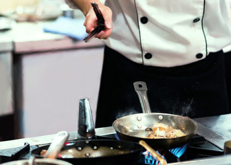 Chef cooking food in the kitchen, Chef preparing food