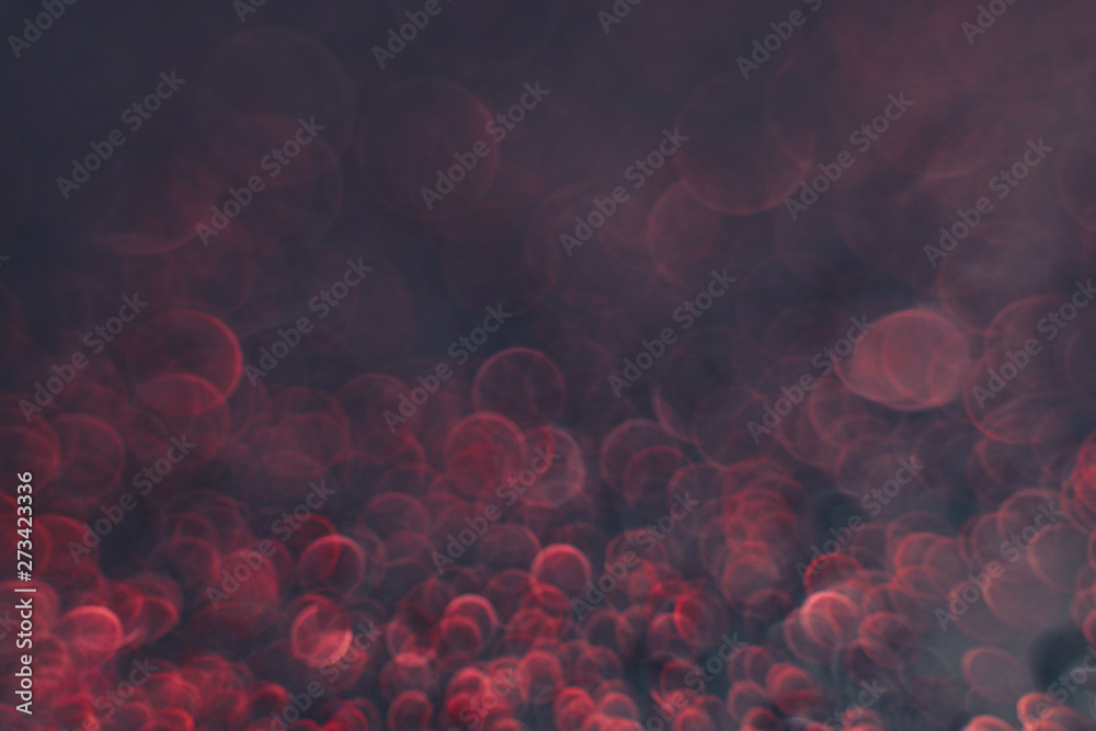 Aufkleber beautiful red bokeh on a dark abstract background.