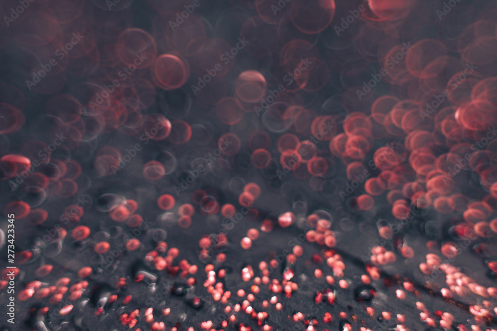 Aufkleber beautiful red bokeh on a dark abstract background.