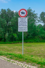 Riding forbidden sign in a polder