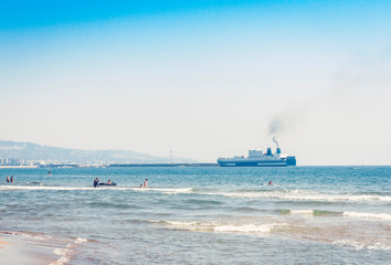 Beautiful seascape with cruise ship from coast of Catania, Sicily, Italy.