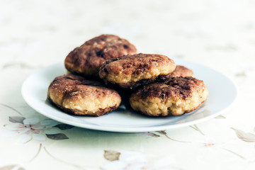 homemade fried minced meat cutlets on white plate, traditional Ukrainian dish .