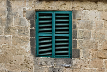 Fototapeta na wymiar Typical maltese wooden window.
