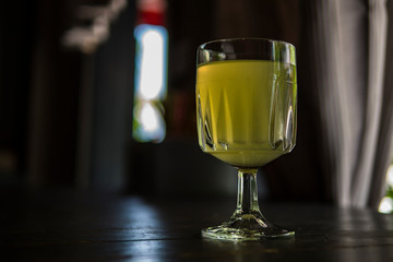 wine glass with lemonade in a summer cafe