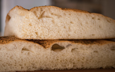 warm bread cut in half in the kitchen