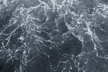 Dark water of stormy sea and white foam. Horizontal color photography. - Powered by Adobe