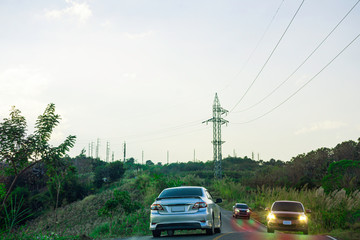 Driving on the road on top of mountain, Landscape nature view on the peak of hills, Roadside view in evening time, Phu Tab Berk mountain in Thailand, Travelling by car with sunset sky