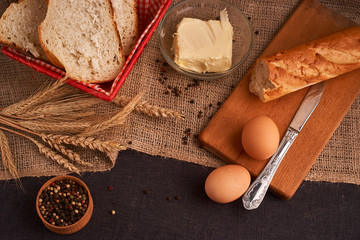 breads and butter concept of teasty home food close up on table