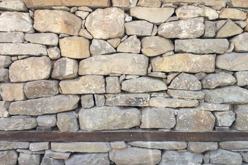 Texture of a stone wood wall. Old castle stone wooden wall texture background.