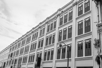 Old Chinese-style building in which the building is made of wood and cement in singapore. Black and white