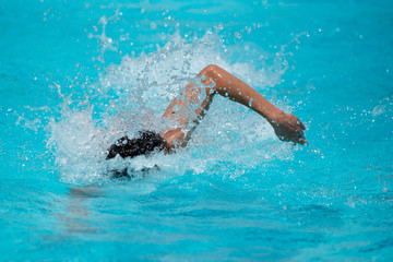 Athletes swimming on a swimming pool