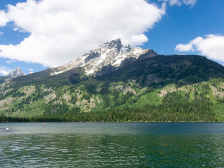 Fototapeta premium A fresh water lake in Montana with blue sky and clouds.