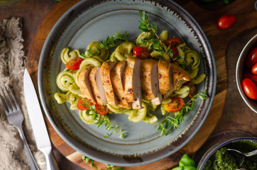 Homemade pesto pasta with grilled chicken