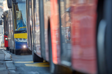 Public transportation / bus in urban surroundings on the street. © astrosystem