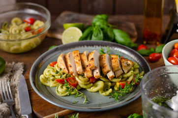 Homemade pesto pasta with grilled chicken