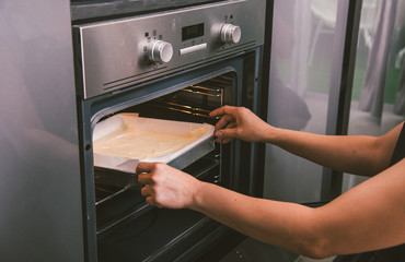 woman female holding dough bread bakery cake fresh on front oven
