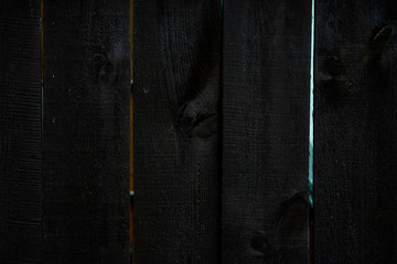 Dark background from wooden boards of natural color