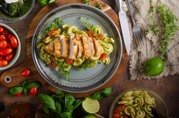 Homemade pesto pasta with grilled chicken