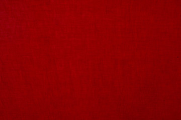 The texture of the old, rough fabric painted in red color