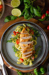 Homemade pesto pasta with grilled chicken