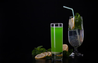 Refreshing mint cocktail on a black background