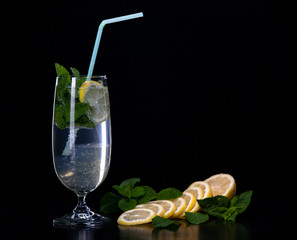 Refreshing mint cocktail on a black background