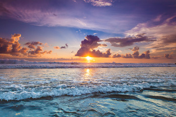 Naklejka na ściany i meble Radiant sea beach sunset