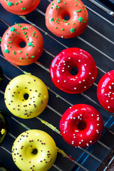 donuts in a glaze mix on  the deco and the trellis