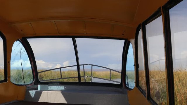 Travelling by boat from Puno to the Uros Islands on the Lake Titicaca, Peru, South America