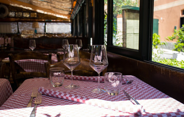 The setting up in a typical italian restaurant, Italy.