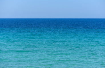 Obraz premium Calm blue sea and blue sky