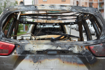 Obraz premium Burnt car. Back view. Close-up