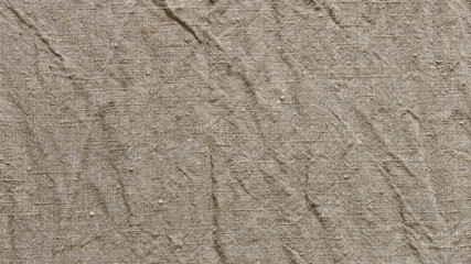 Background texture of linen fabric. Abstract background of crumpled linen fabric.