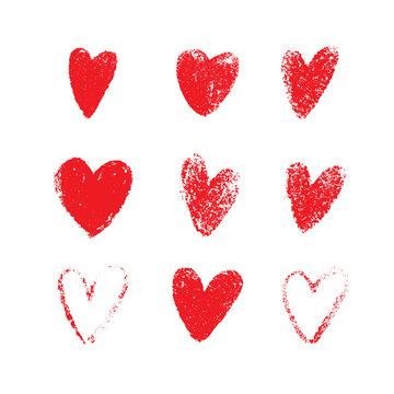 Red hand drawn grunge hearts isolated on white background. Set of love symbols in the shape of heart. Vector illustration for your graphic design