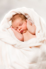 healthy newborn baby two week old sleeping