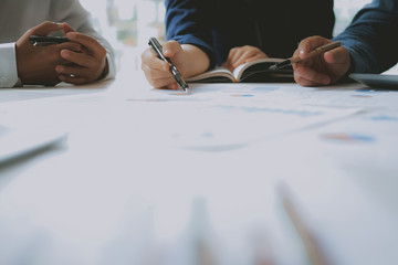 financial adviser discussing with investor. business people have a meeting. businessman working...