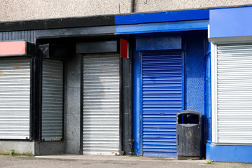 Blue and black shop business closed metal roller shutters