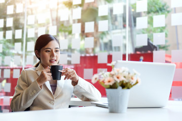 Business woman working in office with documents and laptop people Consulting and business planning.