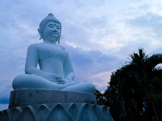 Holy Spirit Big White Meditating Buddha Statue View In The Garden Of Buddhist Temple In The Evening, North Bali, Indonesia