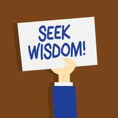 Writing note showing Seek Wisdom. Business concept for ability to think act using knowledge experience understanding Clipart of Hand Holding Up Sheet of Paper on Pastel Backdrop