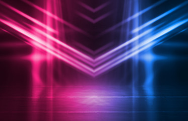 Empty background scene. Dark street reflection on wet asphalt. Rays of neon light in the dark, neon figures, smoke. Background of empty stage show. Abstract dark background.