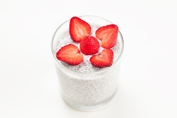 Chia pudding with strawberry on a white background. Space for text or design.