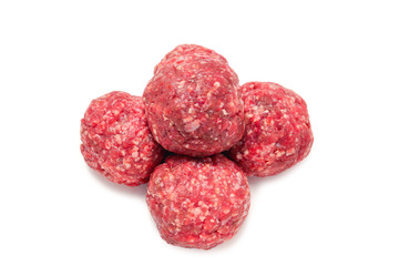 Raw meat balls isolated on white background.