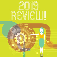 Handwriting text writing 2019 Review. Conceptual photo remembering past year events main actions or good shows Woman Standing and Presenting the SEO Process with Cog Wheel Gear inside