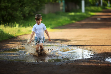 child and puddle