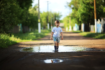 child and puddle