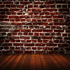 empty interior room with brick wall