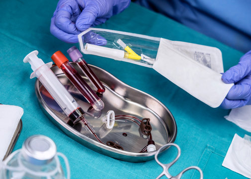 Nurse Prepares Venous Catheters Of Long Duration In A Hospital, Accessing Indwelling Central Venous Lines, Conceptual Image