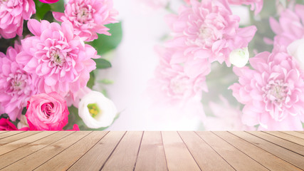 Delicate background of flowers peony. Blurred floral background. Wooden old table on the background of a blooming bouquet